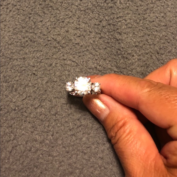 CZ 3 stone ring mounted on silver tone setting. - Picture 3 of 8